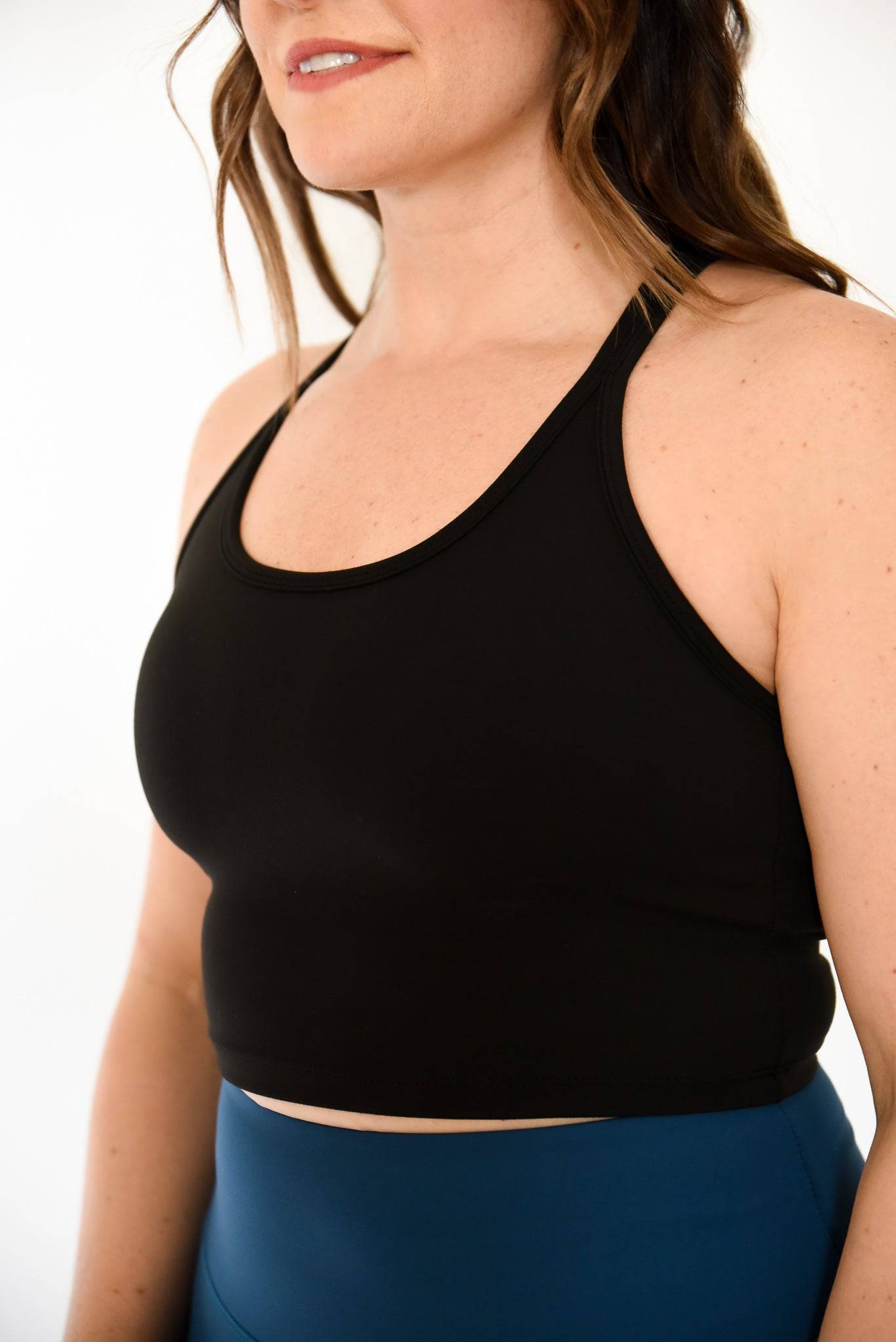 Anthem Sports Bra Front view in Black to show full coverage from front