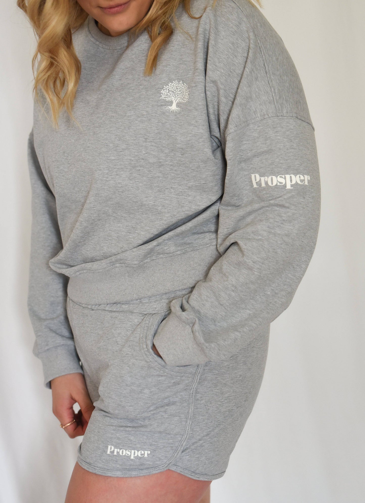 Cotton Dream Sweatshirt in grey showing crop length and paired with matching Cotton Dream Shorts