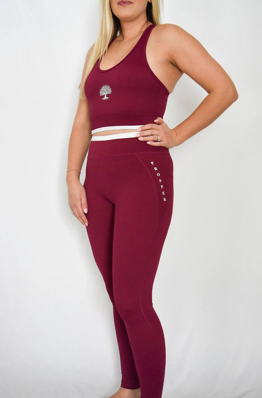 Contender Leggings in Cranberry showing left side view and front